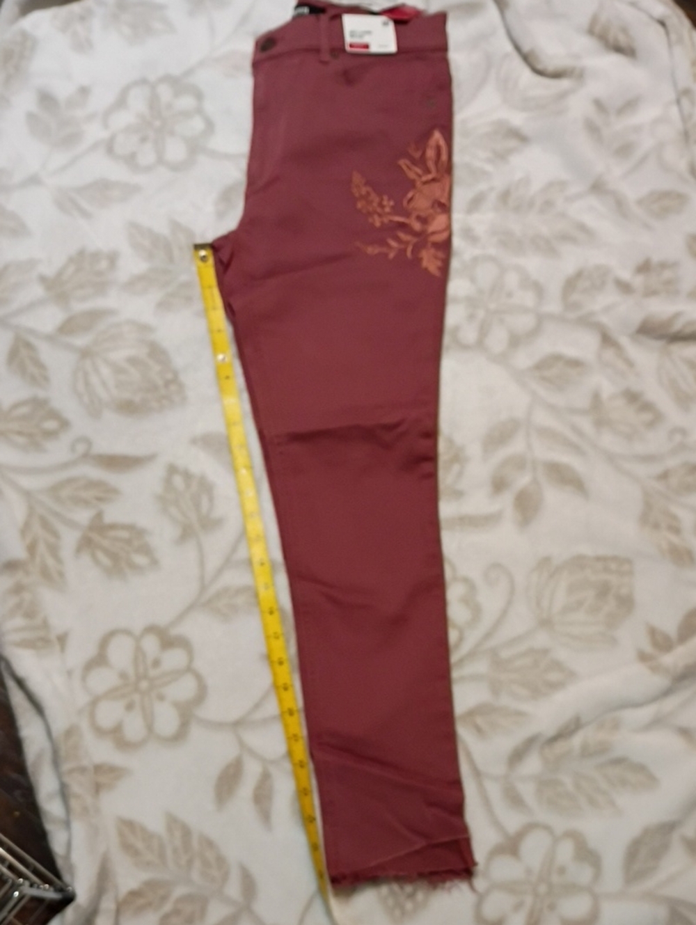 Express Women's Burgundy Skinny Jeans with Embroidered Floral Accent